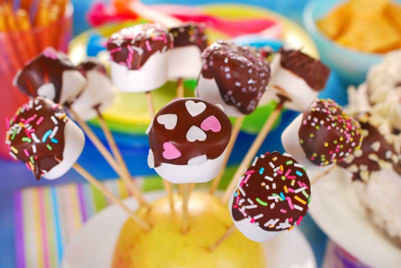marshmallow pops with chocolate and colorful sprinkles
