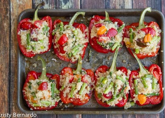 peppers stuffed with lemon quinoa, asparagus, cherry tomatoes & a hidden goat cheese surprise! Good for you and really delicious!