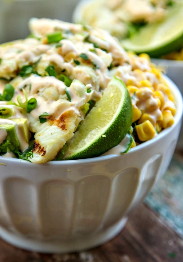 healthy fish taco salads! SO good - you'll never think about all the great nutrients & omega-3's you're getting! | www.thewickednoodle.com | #salad #healthy #fish