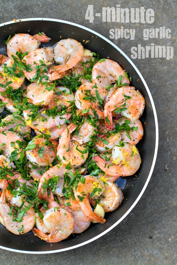 This easy recipe for Spicy Garlic Shrimp comes together in just 4 minutes. Fresh shrimp sauteed with garlic, crushed red pepper and lemon juice, delicious!