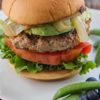 the secret is to toss the veggies in a blender before adding to the turkey meat! Makes for a super-moist, flavorful & healthy burger! | www.thewickednoodle.com