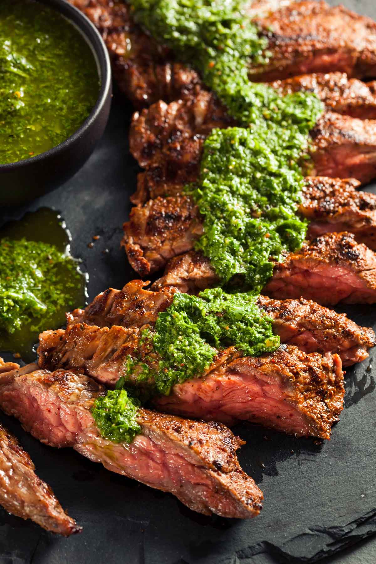 grilled steak topped with chimichurri as an example of how to use chimichurri