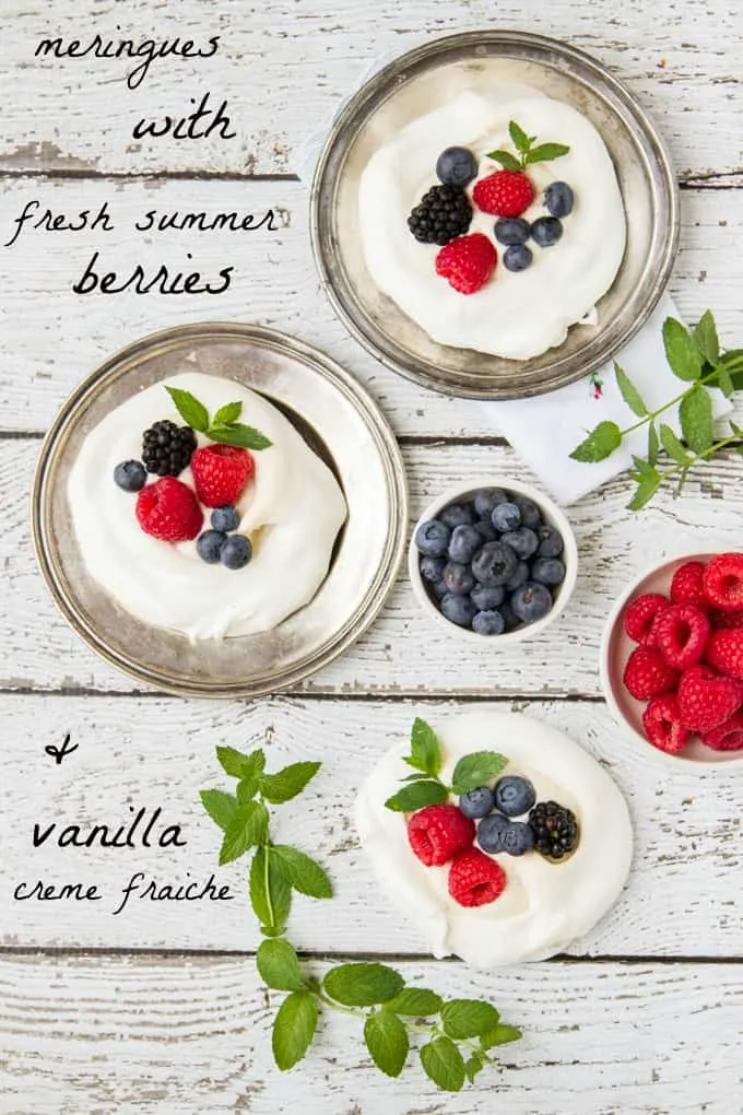 meringues with fresh summer berries and vanilla creme fraiche - or "what do make with leftover egg whites"! Such an easy, elegant dessert!