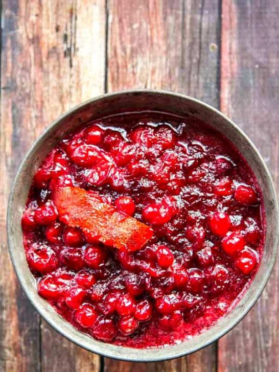 Put down that can opener! Homemade Cranberry Sauce couldn't be more simple yet tastes amazing. This version can be made with or without the additional flavor of orange - delicious!