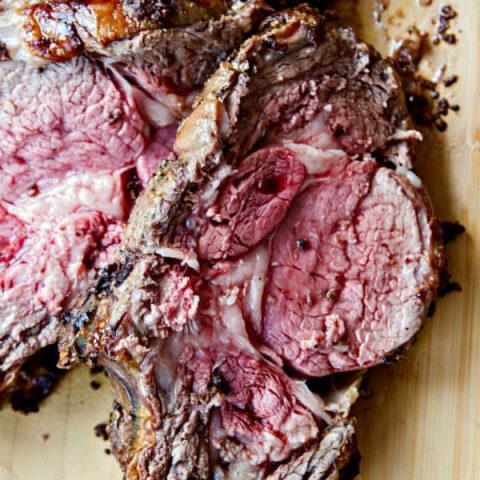 Standing Rib Roast (aka Prime Rib) couldn't be easier or be more popular on your holiday table! A superfast mustard, peppercorn and garlic wet rub seals in the juices and is out-of-this-world delicious!