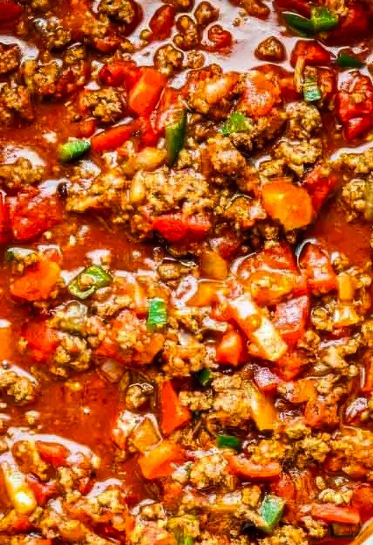 Thick and Beefy Beanless Chili Recipe a closeup of beanless chili showing the ground beef and peppers
