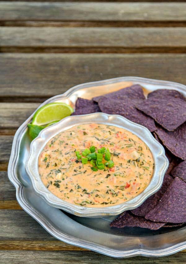 This is a copycat recipe of Jose Peppers Espinaca Dip recipe! It's cheesy with so much flavor (and uses homemade Velveeta if you'd prefer that to buying it)!