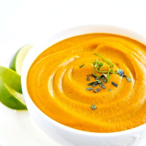 This ultra- creamy Roasted Carrot Soup is easy, delicious and healthy! Make it on the stove top or use your Vitamix; I've got directions for both!