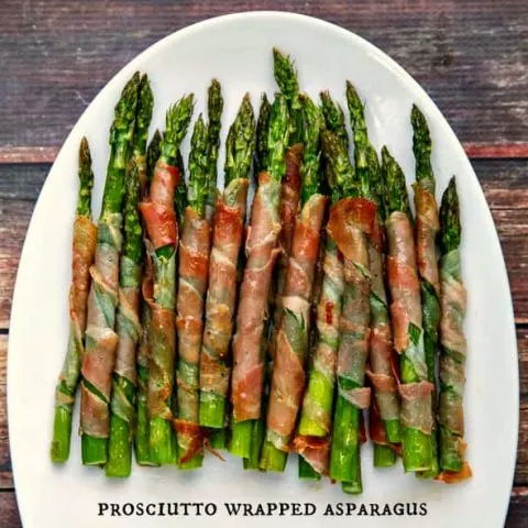 Prosciutto Wrapped Asparagus is incredibly simple to throw together and perfect in the oven or on the grill!
