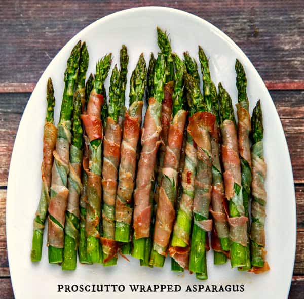 Prosciutto Wrapped Asparagus is incredibly simple to throw together and perfect in the oven or on the grill!