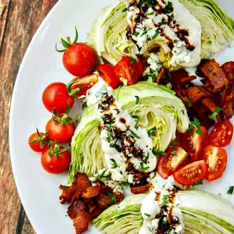A simple Wedge Salad with Bacon, Blue Cheese and a 5-minute Balsamic Syrup Drizzle!