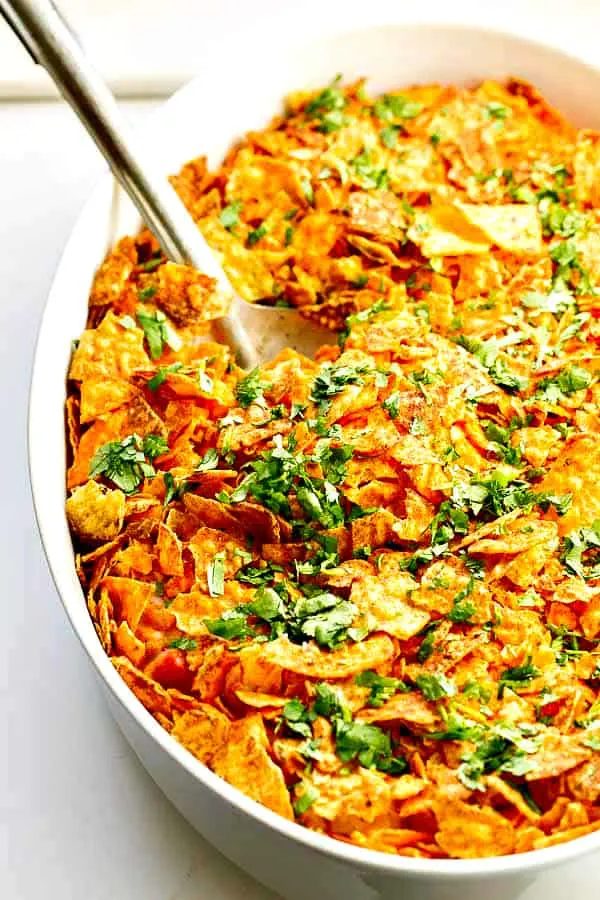 Dorito Casserole!! Don't knock it until you try it...plus it's great for picky kids (there's an entire rotisserie chicken in the filling)!