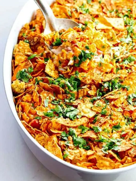 Dorito Casserole!! Don't knock it until you try it...plus it's great for picky kids (there's an entire rotisserie chicken in the filling)!