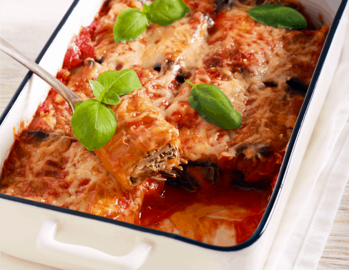Eggplant rollatini in a white baking dish