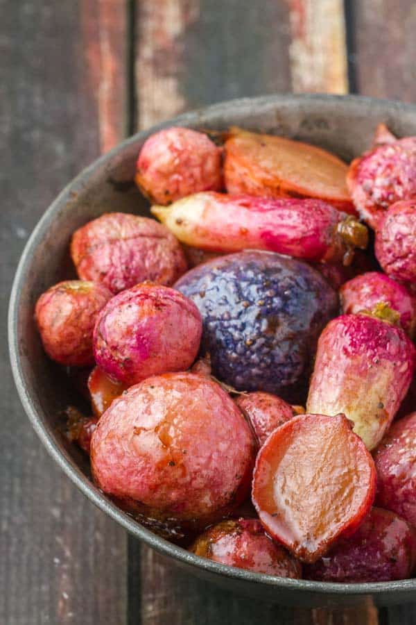 Roasted Radishes are sweeter without the bite of raw radish. Add a little balsamic & honey and they make a fantastic side dish or snack!