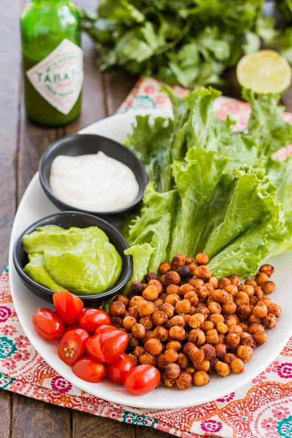 TABASCO Roasted Chickpeas! Just toss canned chickpeas with your favorite TABASCO flavor, sprinkle on a little salt and toss 'em in the oven! PLUS some healthy, delicious ways to use them (like stuffed avocados and lettuce wraps)!