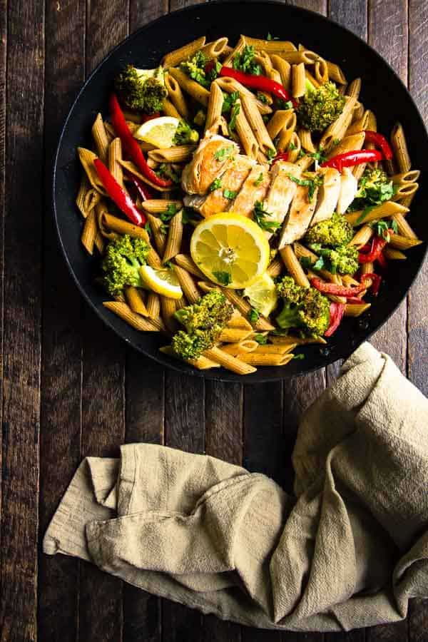 Lemon Pepper Chicken Pasta - pasta, broccoli and red bells with chicken and delicious lemon pepper! Sub your favorite veggies or skip the chicken to make it vegetarian. 