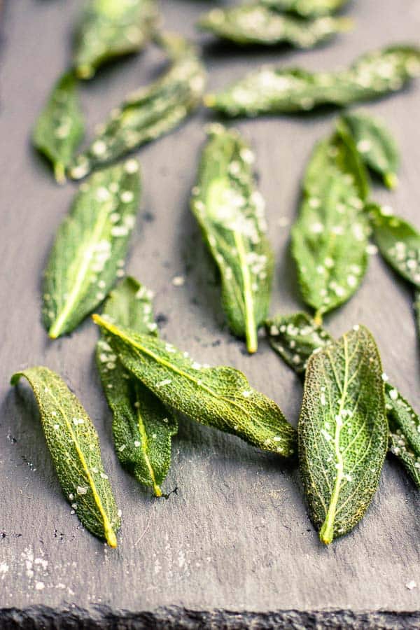 Fried Sage Leaves are so simple and an addictive, delicious snack! Use them to top your fall dishes for a sophisticated finish, too!