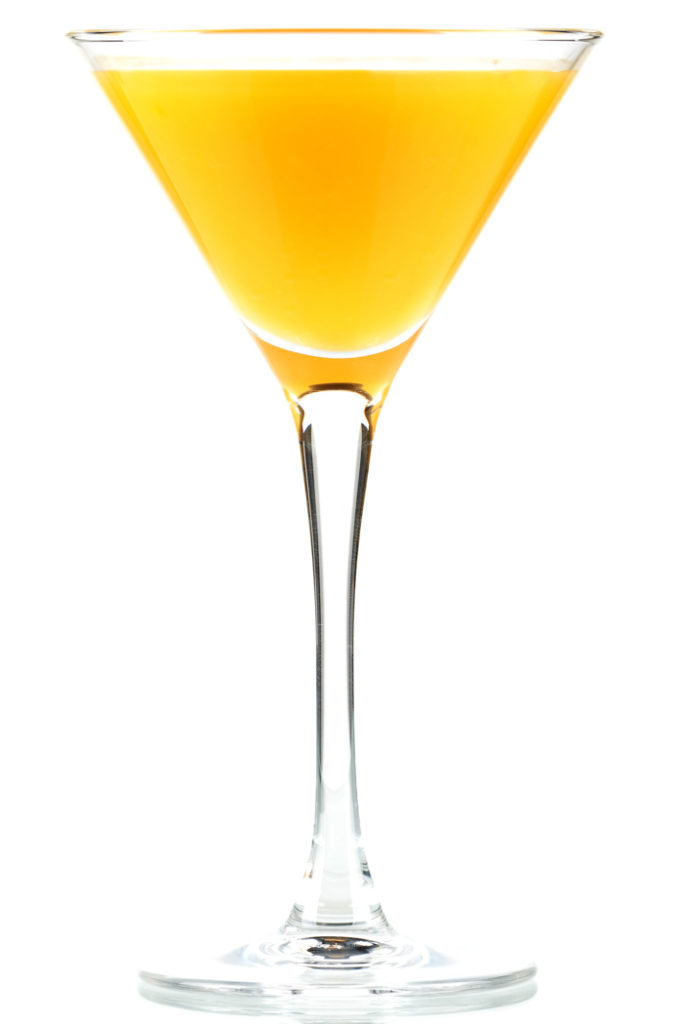 a passion fruit martini on a white background