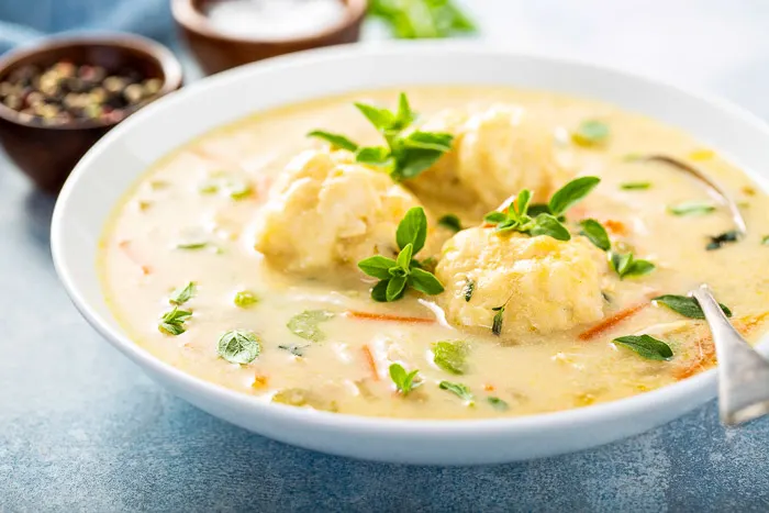 side view of a bowl of keto chicken and dumplings recipe