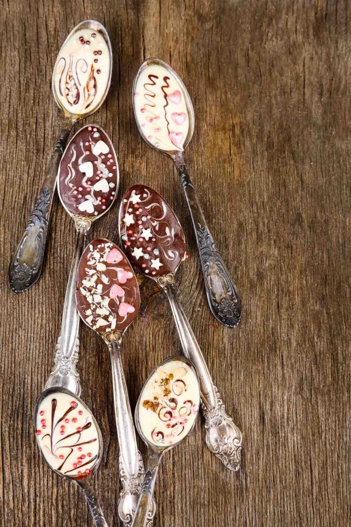 chocolate spoons on a wooden table