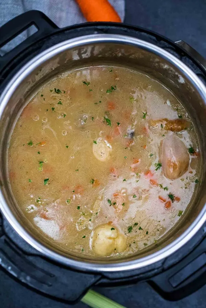 simmering instant pot chicken and dumpling ingredients just before adding the dumplings