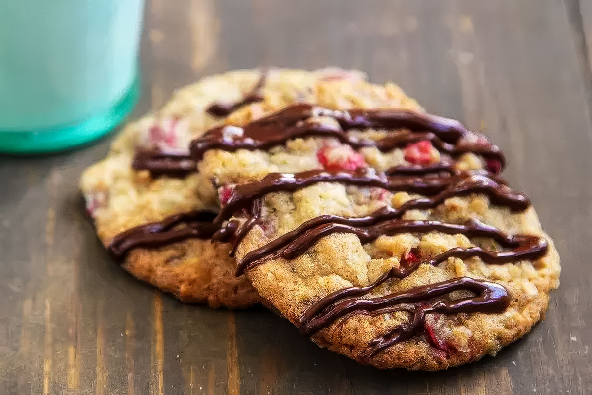 Cranberry Oatmeal Chocolate Chip Cookies cranberry oatmeal chocolate chip cookies that have just been drizzled with melted chocolate