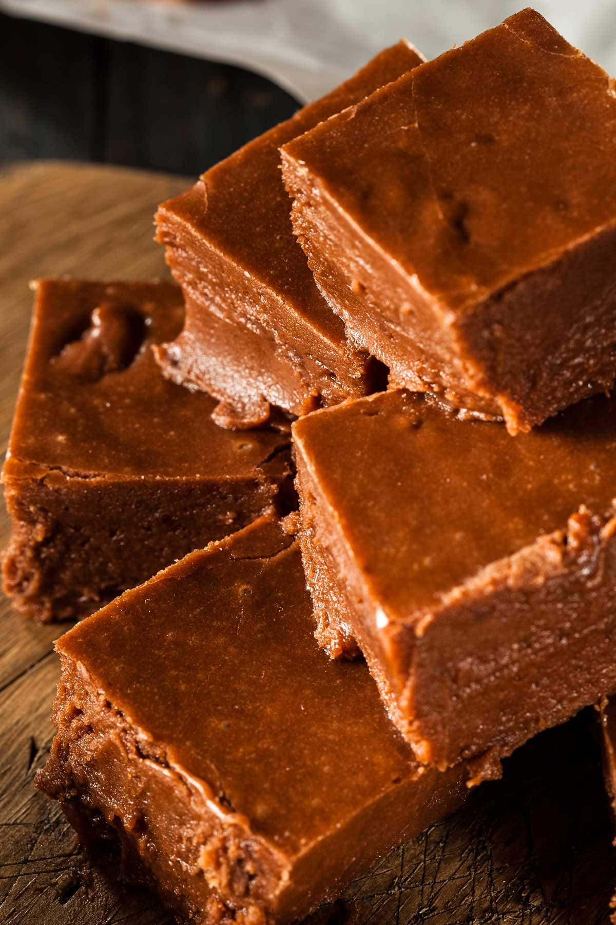 a closeup side view of a stack of easy chocolate fudge