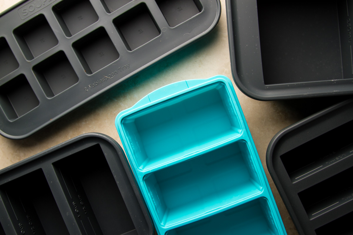 assorted sizes of freezer cubes, both the souper cubes brand and a knockoff