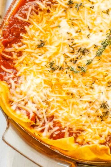 a casserole dish filled with baked lemon ricotta pasta just out of the oven