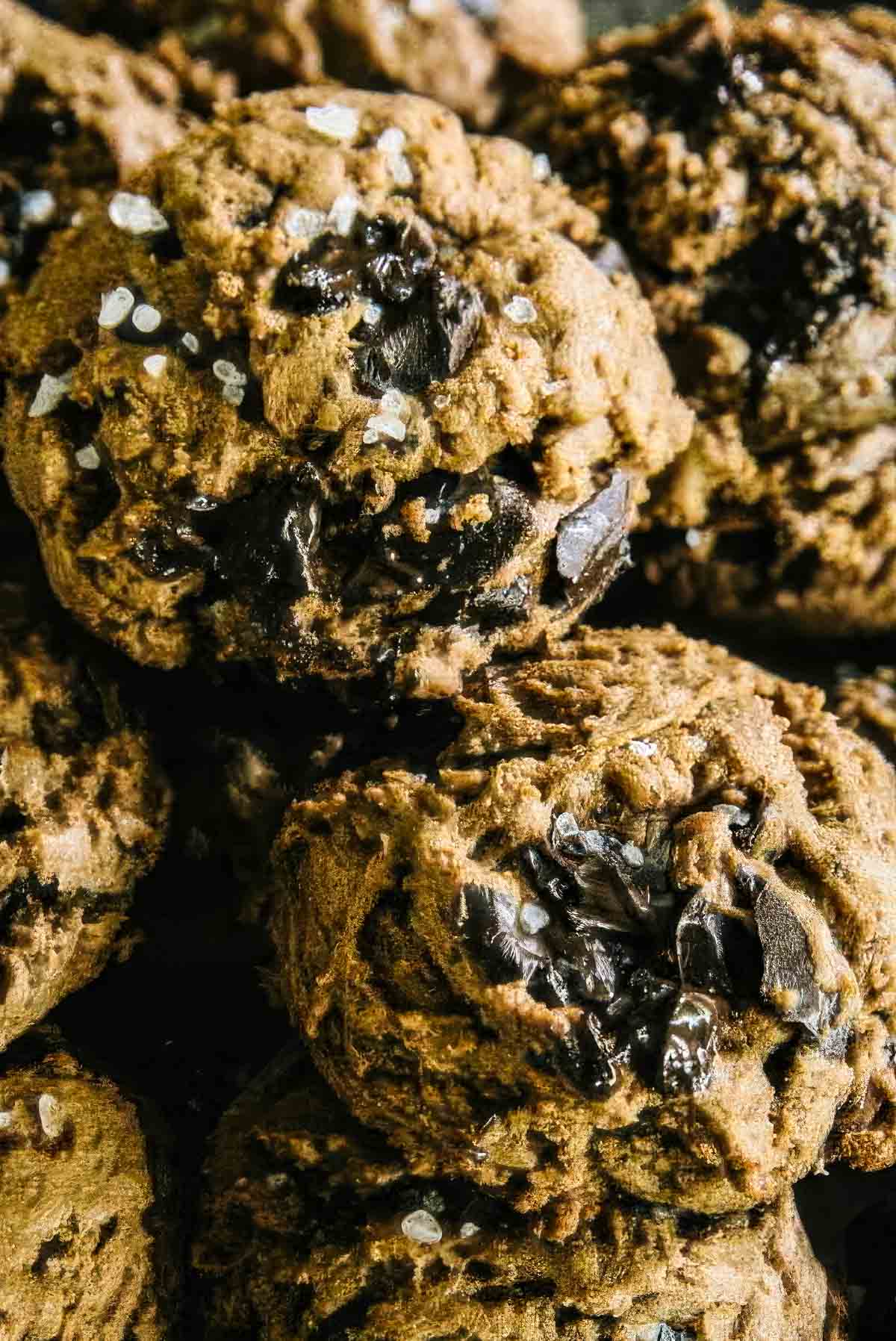 a vintage plate filled with double chocolate cookies topped with sea salt