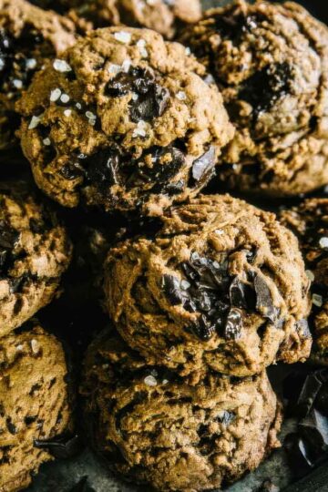 Double Chocolate Cookies a vintage plate filled with double chocolate cookies topped with sea salt