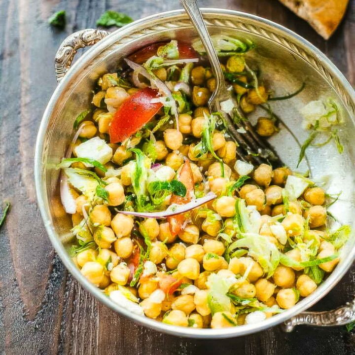 an overhead shot of chickpea feta salad in a vintage metal bowl