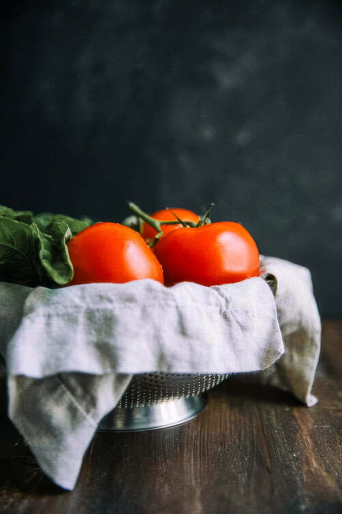 Authentic Italian Marinara Sauce a basket filled with fresh ingredients for authentic italian marinara sauce
